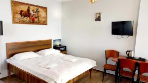 Letto o letti in una camera di IVERIA BEACH