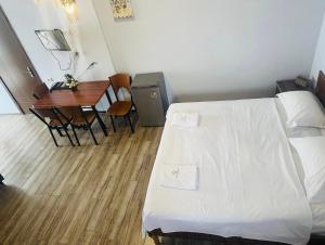 Letto o letti in una camera di IVERIA BEACH
