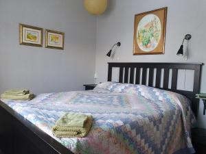 Postel nebo postele na pokoji v ubytování Ekeliden B&B