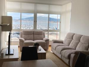 Posedenie v ubytovaní Apartamento con vistas en Baiona