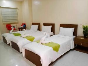 Letto o letti in una camera di RNR Suites