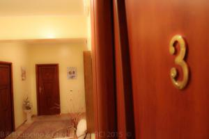 A bed or beds in a room at Cuscino & Cappuccino