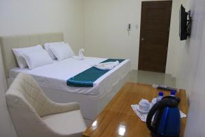Letto o letti in una camera di RNR Suites
