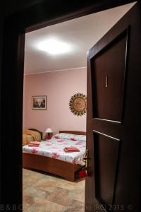 A bed or beds in a room at Cuscino & Cappuccino