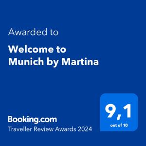 um sinal azul com o texto queria dar as boas-vindas a munich pela marina em Welcome to Munich by Martina em Munique