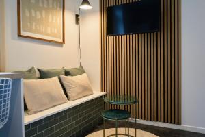 TV a/nebo společenská místnost v ubytování 1 bedroom apartment near Villa Cavrois - Croix