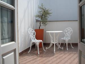 Balkón nebo terasa v ubytování Guesthouse Muralhas do Mino
