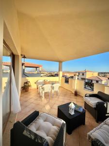 Posedenie v ubytovaní Casa Carmen - Attico vista mare