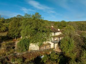 an aerial view of a house in the woods at MAS DEL LUM in Boussac