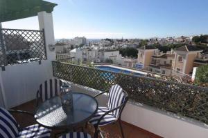 Swimmingpoolen hos eller tæt på Amplio apartamento con piscina cerca de la playa + 5 billeder