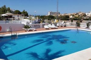 Bazén v ubytovaní Apartamento con piscina en Las Rosas de Capistrano alebo v jeho blízkosti