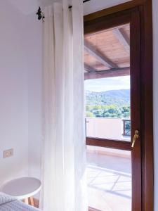 Fotografia z galérie ubytovania Casa Carmen - Attico vista mare v destinácii Porto San Paolo