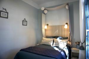 Postel nebo postele na pokoji v ubytování Le Pavillon d'été 4* - élégant et lumineux + 7 fotografií