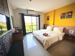 Postel nebo postele na pokoji v ubytování I Hotel Khonkaen