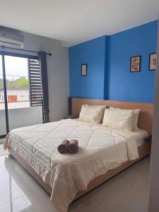 Postel nebo postele na pokoji v ubytování I Hotel Khonkaen