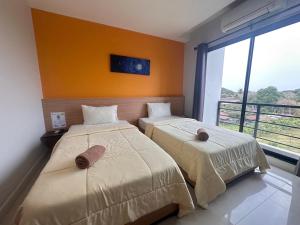 Postel nebo postele na pokoji v ubytování I Hotel Khonkaen