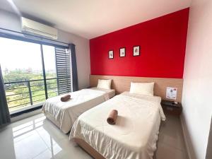Postel nebo postele na pokoji v ubytování I Hotel Khonkaen