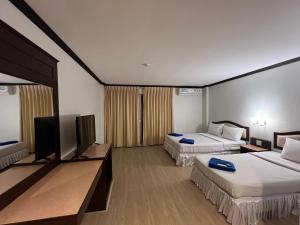 Cama o camas de una habitación en Keep Aonang