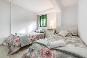 Posteľ alebo postele v izbe v ubytovaní Bettatur Apartaments Rera Sant Domenech