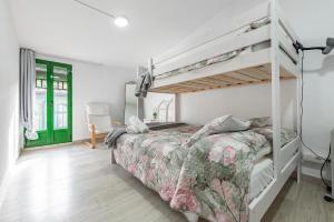 Posteľ alebo postele v izbe v ubytovaní Bettatur Apartaments Rera Sant Domenech