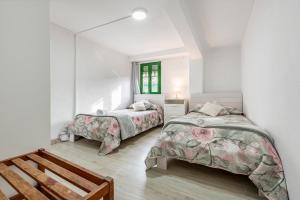Posteľ alebo postele v izbe v ubytovaní Bettatur Apartaments Rera Sant Domenech