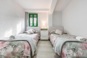 Posteľ alebo postele v izbe v ubytovaní Bettatur Apartaments Rera Sant Domenech
