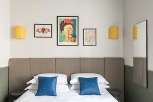 Voodi või voodid majutusasutuse Hotel Montecarlo toas