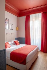 Postel nebo postele na pokoji v ubytování Hotel Montecarlo
