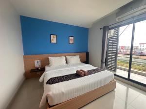Postel nebo postele na pokoji v ubytování I Hotel Khonkaen