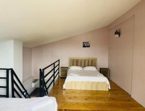 Letto o letti in una camera di IVERIA BEACH