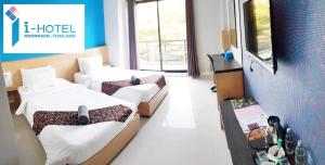Postel nebo postele na pokoji v ubytování I Hotel Khonkaen