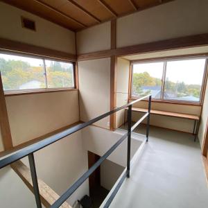 a room with two windows and a staircase at Togaku Hokosha Female -over16 years old- Only Guest House - Vacation STAY 15724 in Nagano