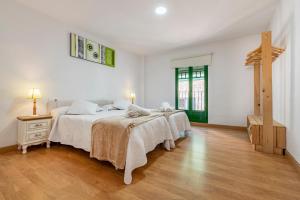 Posteľ alebo postele v izbe v ubytovaní Bettatur Apartaments Rera Sant Domenech