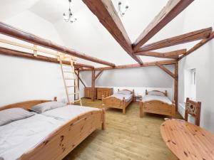 Letto o letti in una camera di Marcelína