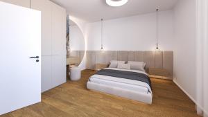 a bedroom with a large bed in a room at Lifestyle Apartments Dante in Bardolino +54 photos
