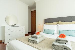 Postel nebo postele na pokoji v ubytování Apartamento Netos - By WeHost Madeira