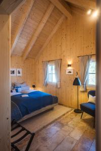Llit o llits en una habitació de Chalet Jochwand Bad Goisern