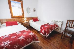 Postel nebo postele na pokoji v ubytování LA GINESTA 1, Apartaments de munyanya