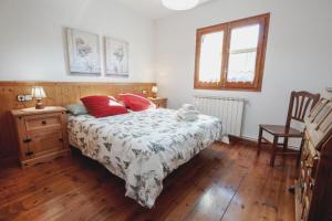 Postel nebo postele na pokoji v ubytování LA GINESTA 1, Apartaments de munyanya