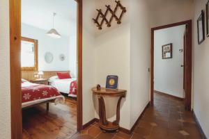 Postel nebo postele na pokoji v ubytování LA GINESTA 1, Apartaments de munyanya