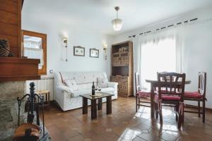 Posezení v ubytování LA GINESTA 1, Apartaments de munyanya