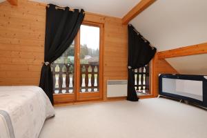Postel nebo postele na pokoji v ubytování Le Chalet du Lac - Dans un environnement idéal