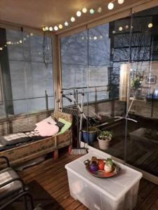 a room with a bowl of fruit on a table at Central Cozy 2BDR Getaway Sauna Free Park + Wi-Fi in Helsinki