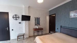 Letto o letti in una camera di IVERIA BEACH