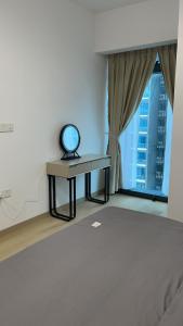 Foto Kuala Lumpuris asuva majutusasutuse 伊顿Eaton Residences 双子塔旁 无边银河泳池 五星民宿 坐揽无敌夜景 便捷行李寄存 galeriist