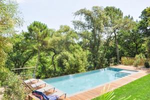 The swimming pool at or close to Pyla Villa esprit cabane Vue imprenable