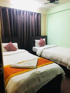 Letto o letti in una camera di Yeti Cozy Hotel