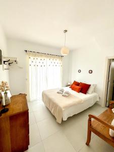 Vila Fortaleza客房内的一张或多张床位