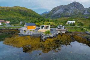 an aerial view of a home in a mountain at Oceanview Mini-House - Stunning Views in Ramberg