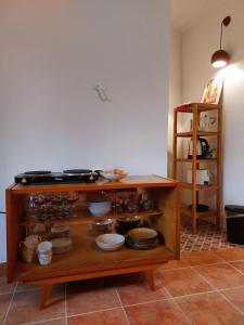 a kitchen with a counter with pots and pans at Selo Station in Črniče